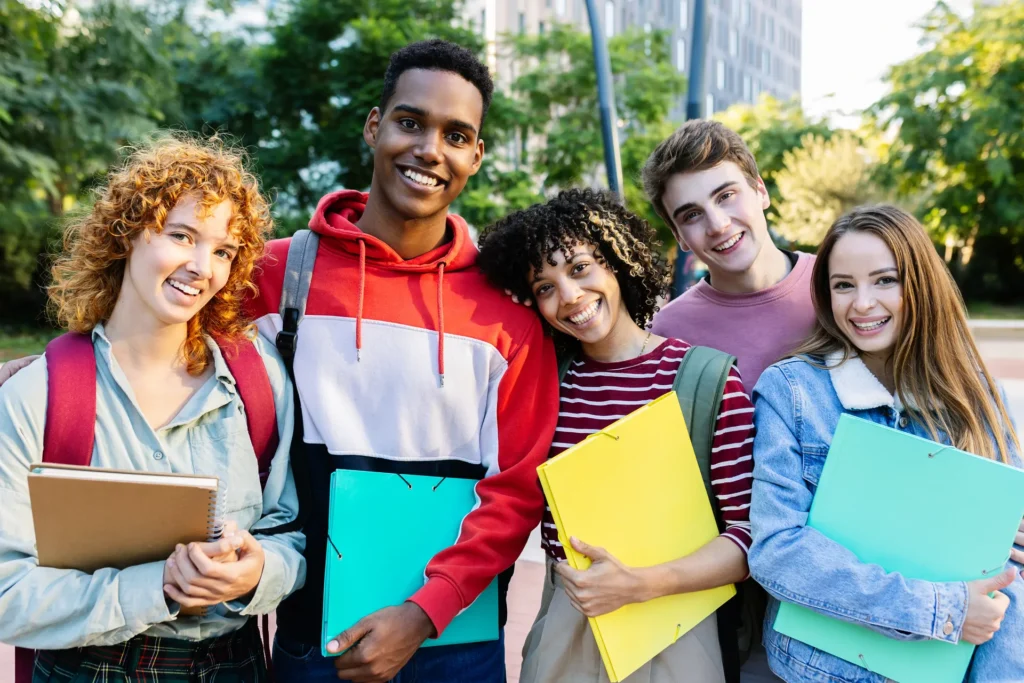 Multiracial group of students standing together